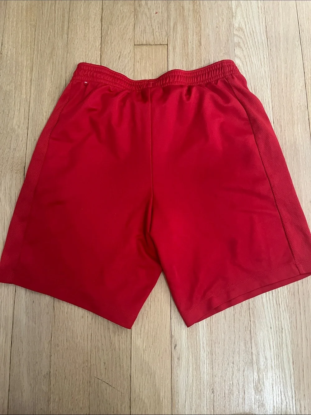 Nike Red Athletic Shorts with White Swoosh